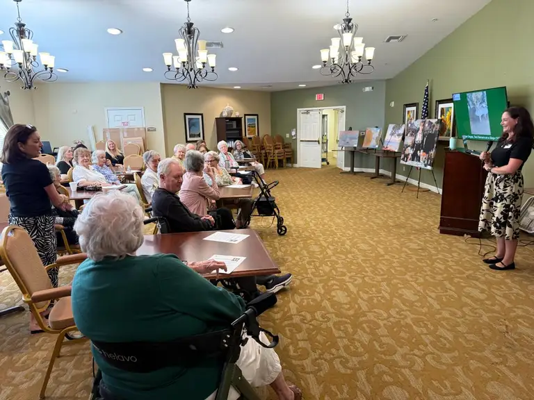 DOCENT art presentation with an engaged audience