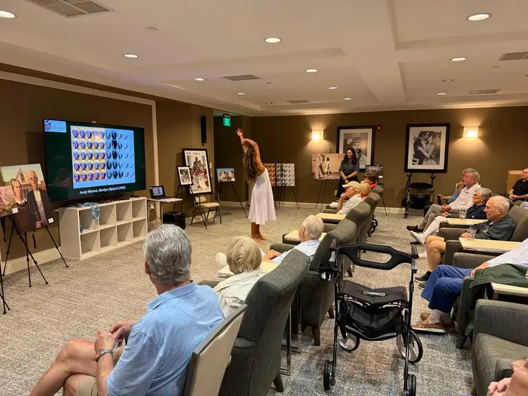 DOCENT art presentation with an engaged audience